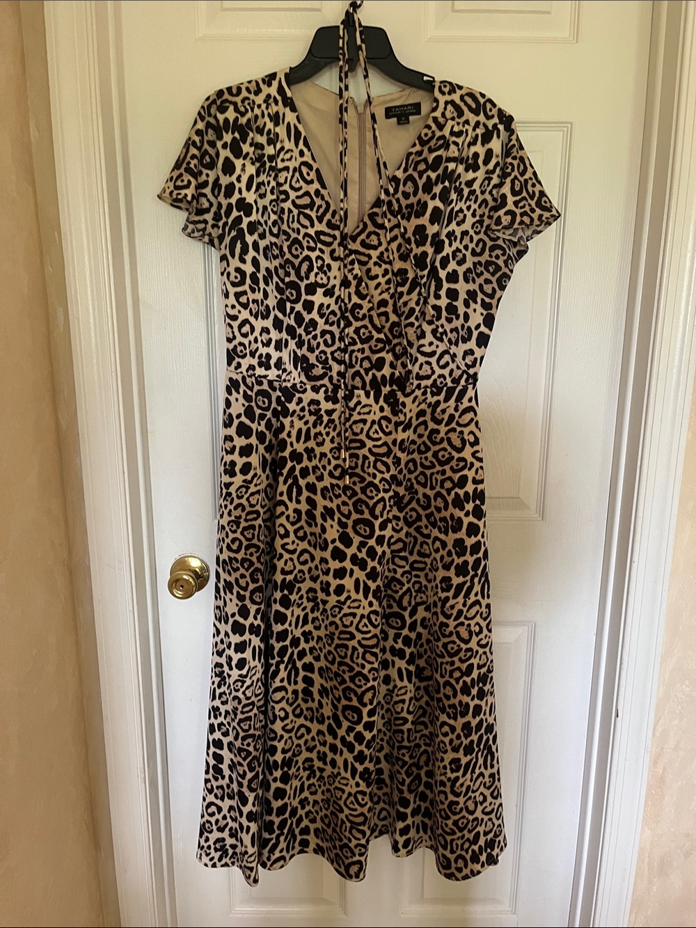 Tahari cheetah print surplus mini dress. Size 10.